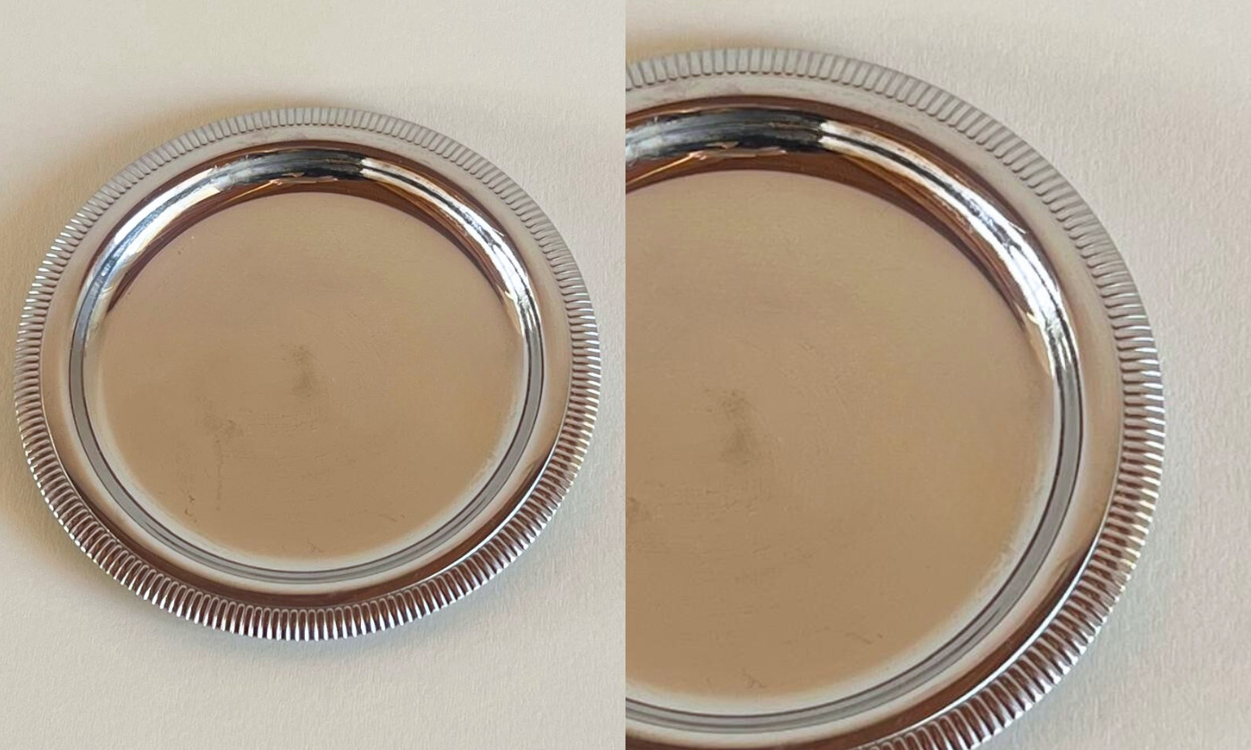 Two views of a round metal object with a beige center on a white background