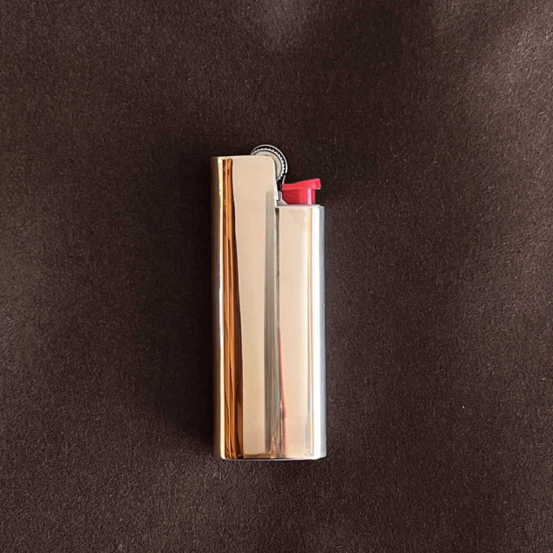 Mirror-finish sterling silver Mini Bic lighter case in polished silver, L'Officina, made in Tuscany