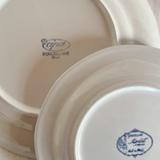 Timeless classic porcelaine plates on elegant table back plate