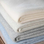 Sofia Toscano cream throw blanket in recycled wool and cashmere, brushed finish and fringed ends