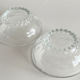 Set of 2 clear mid-century pressed glass bowls with bubble feet and round rims from Reims, France