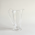 Villeroy & Boch Vinobile crystal carafe holding juice, rounded body catching the light