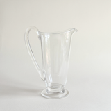 Villeroy & Boch Vinobile crystal carafe holding juice, rounded body catching the light
