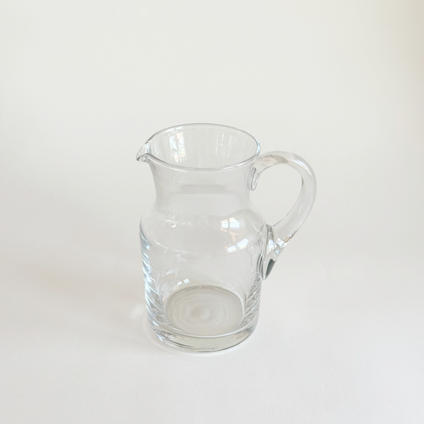 1980s Italian clear glass jug, curved crystal body with moulded handle, 1.25 L capacity