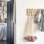 Ecru cotton mesh shopping net by Filt 1860 held in the hand, plastic-free French market bag