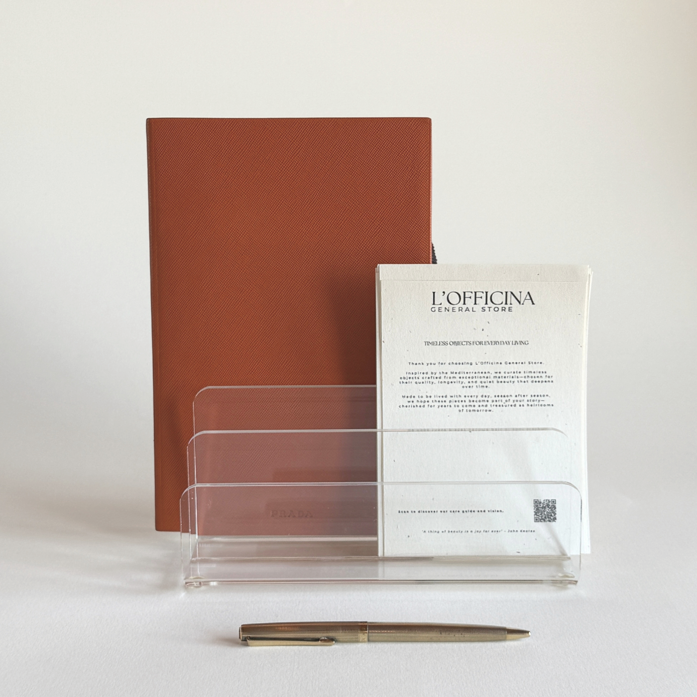 Prada Saffiano leather A5 notebook in burnt orange, article 2AR395 from the AW05 collection, 126 pages