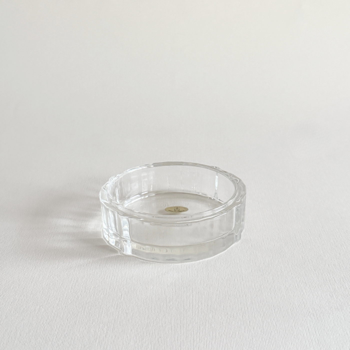 Cut crystal catch-all in use, holding keys and coins by the door