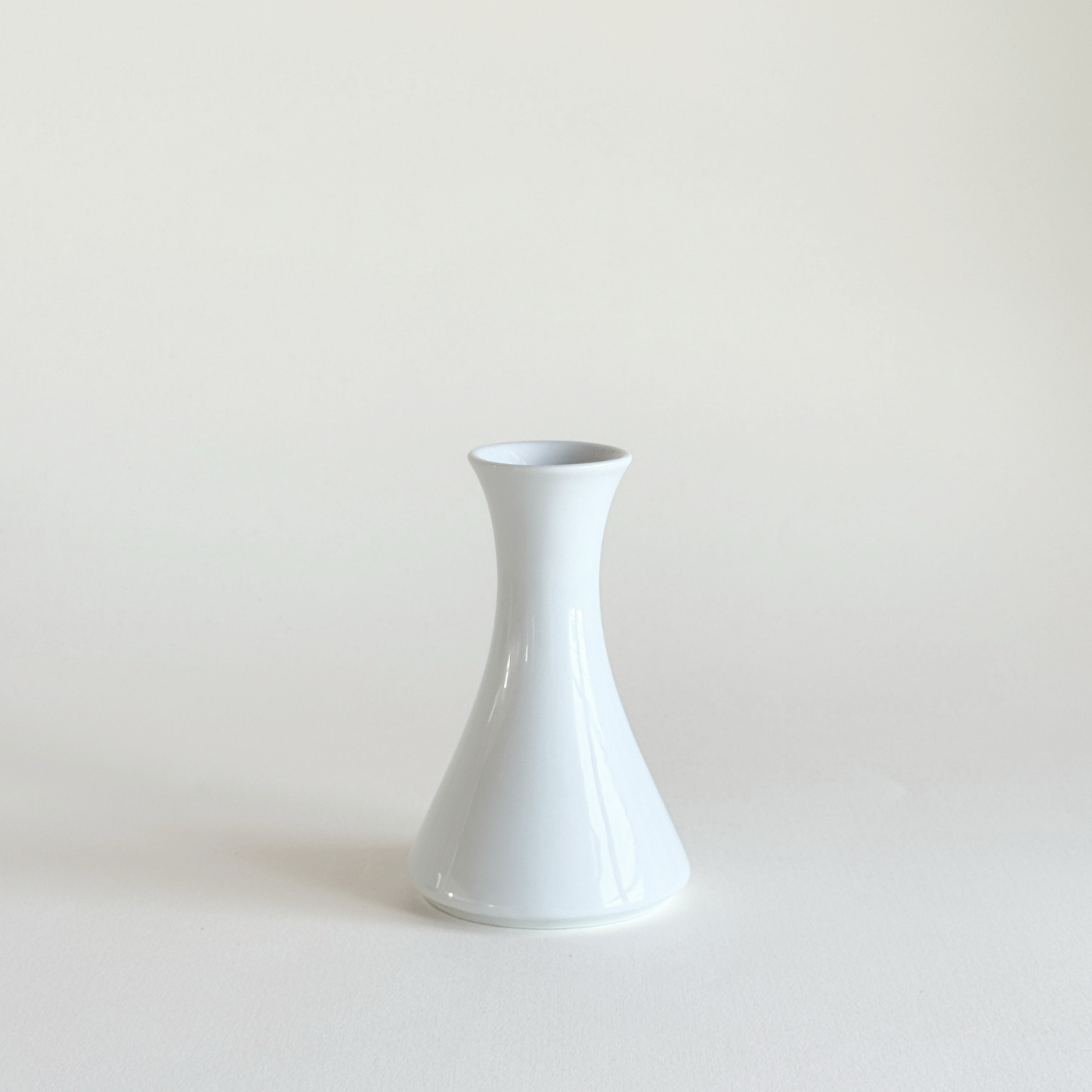 Seltmann Weiden bud vase in satin white Bavarian porcelain with flared lip and weighted base
