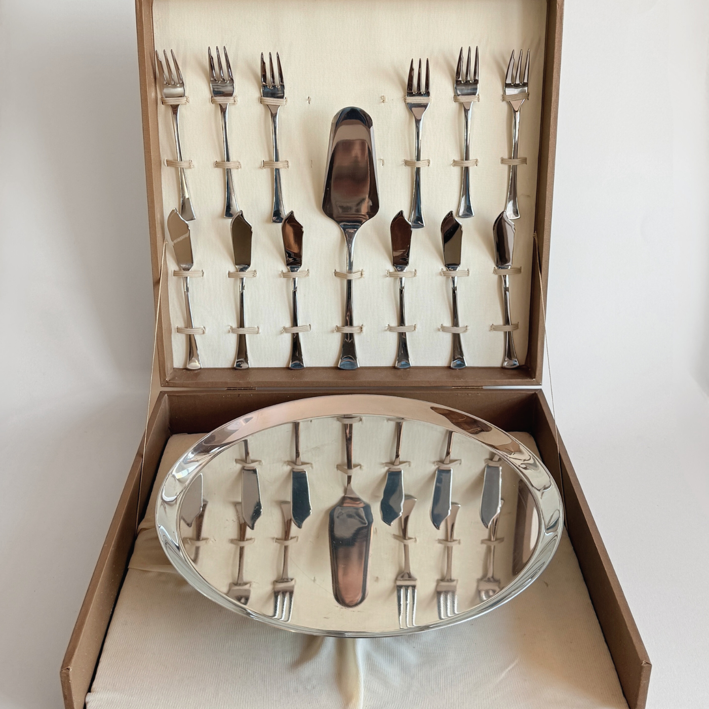 Vintage Morinox cake set including 6 forks, 6 knives, and cake server