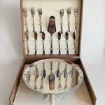 Vintage Morinox cake set including 6 forks, 6 knives, and cake server