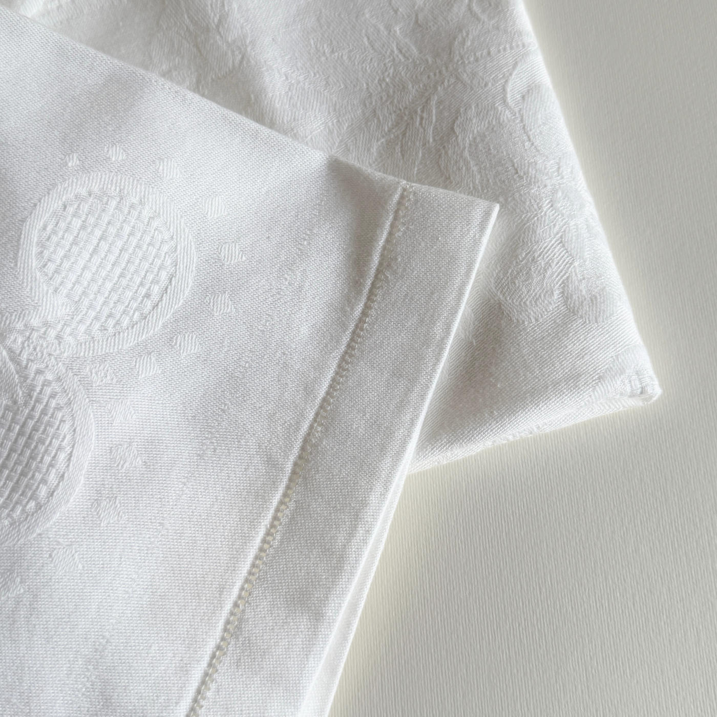 Detail of the woven cotton and embroidery edge of the hand towel