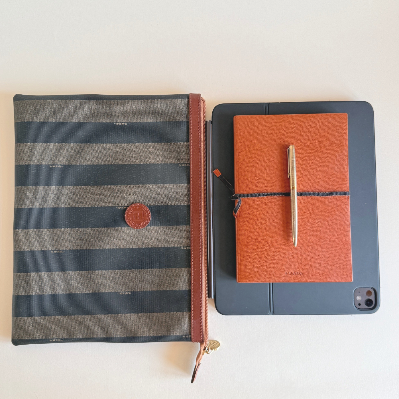Prada Saffiano leather A5 notebook in burnt orange, pre-loved Italian leather goods from the 2000s