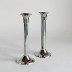 Polished stainless steel candle holder detail, plain bobeche and steel column, L'Officina General Store