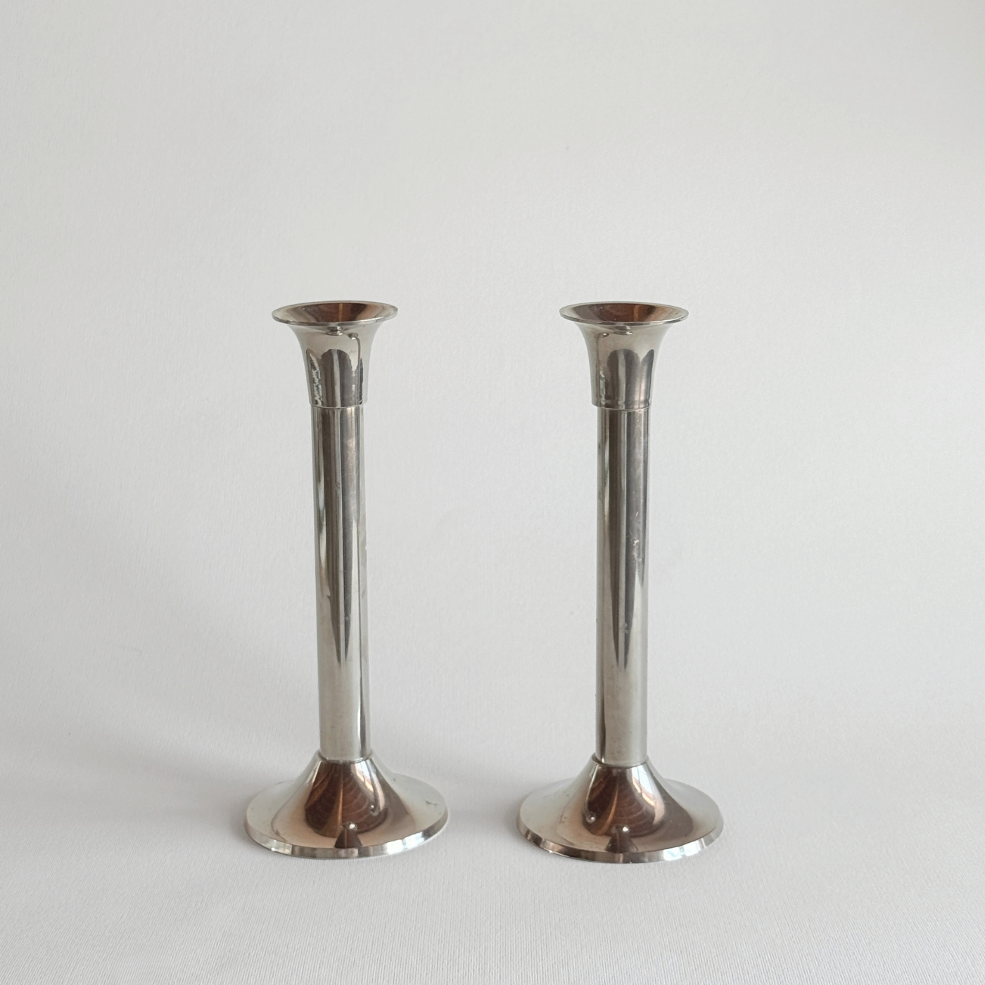 Polished stainless steel candle holders, 18 cm French pair in silver tone, L'Officina General Store
