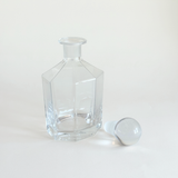 Faceted hexagonal glass decanter in clear crystal with heavy sphere stopper for spirits