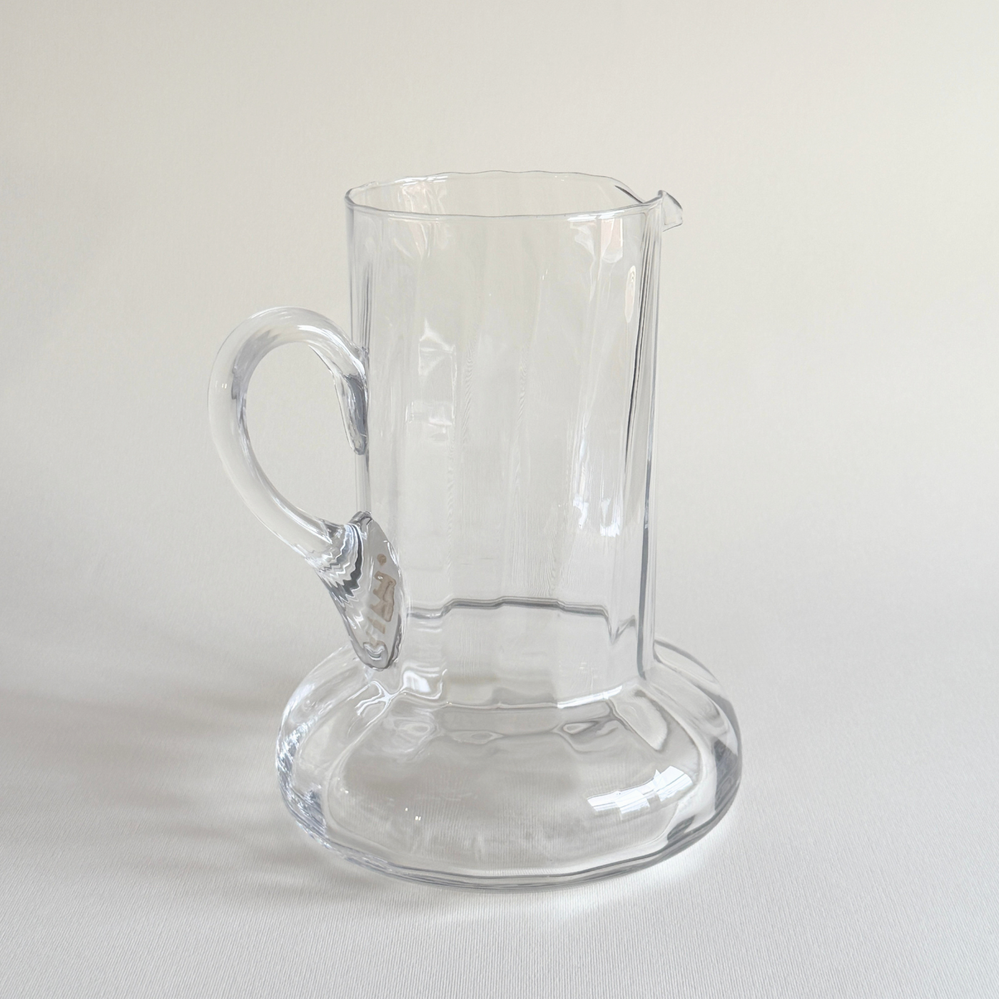 Close view of the ribbed body of the handblown glass carafe