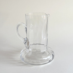 Close view of the ribbed body of the handblown glass carafe