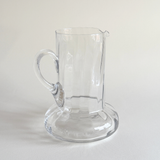 Close view of the ribbed body of the handblown glass carafe