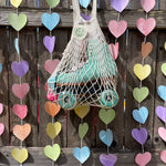 Filt 1860 undyed ecru cotton mesh market bag carried on the shoulder, reusable and made in France