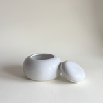 Rounded Italian porcelain jar in white glaze, 10.5 cm tall with 8.5 cm opening, made in Italy, 1980s