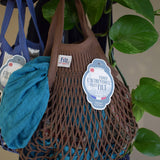 Mini sepia brown cotton net bag by Filt 1860 shown folded flat, plastic-free French mesh