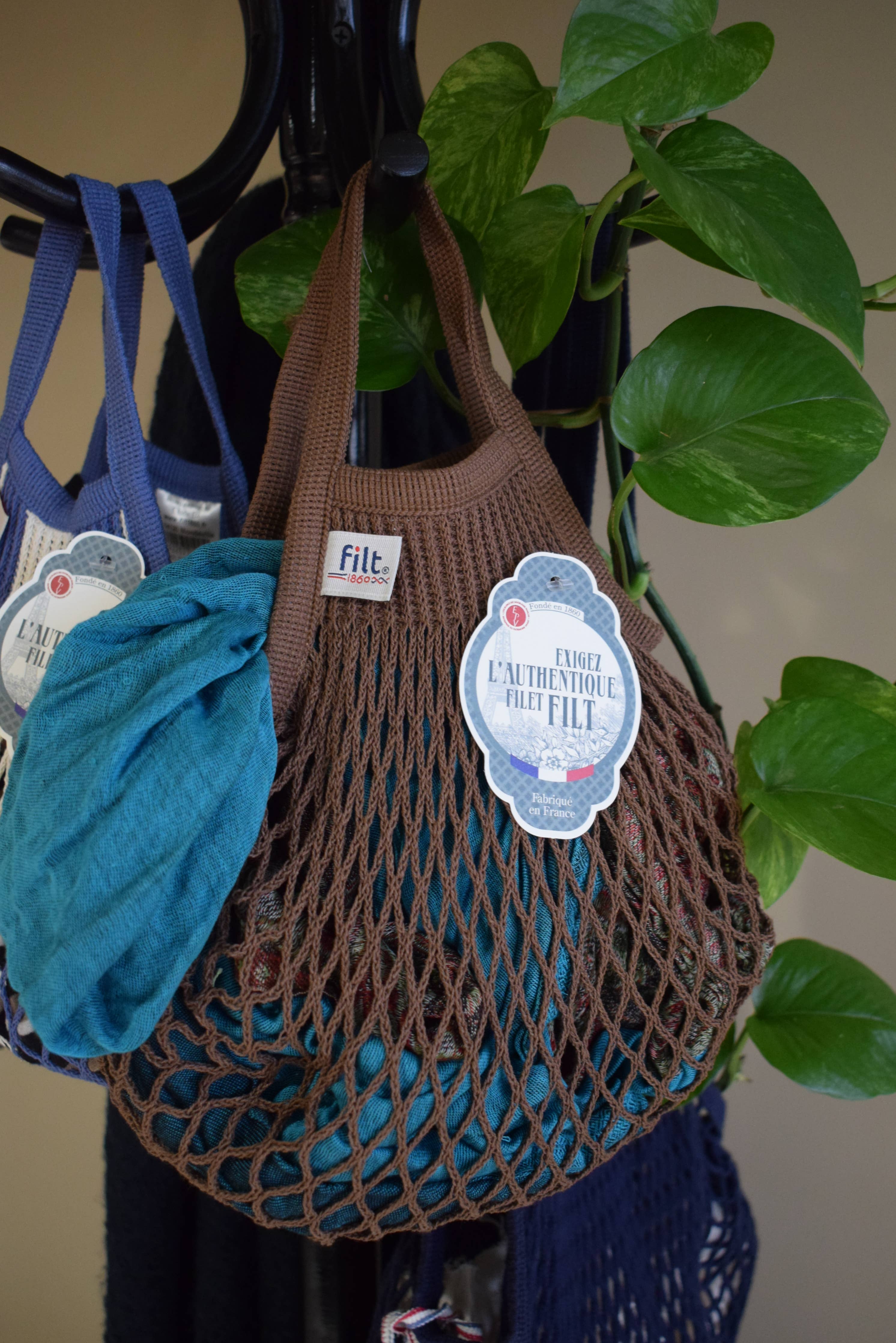Mini sepia brown cotton net bag by Filt 1860 shown folded flat, plastic-free French mesh
