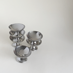 L'Officina mirror-polished stainless steel sorbet cups, low wide silver form, 1970s French tableware