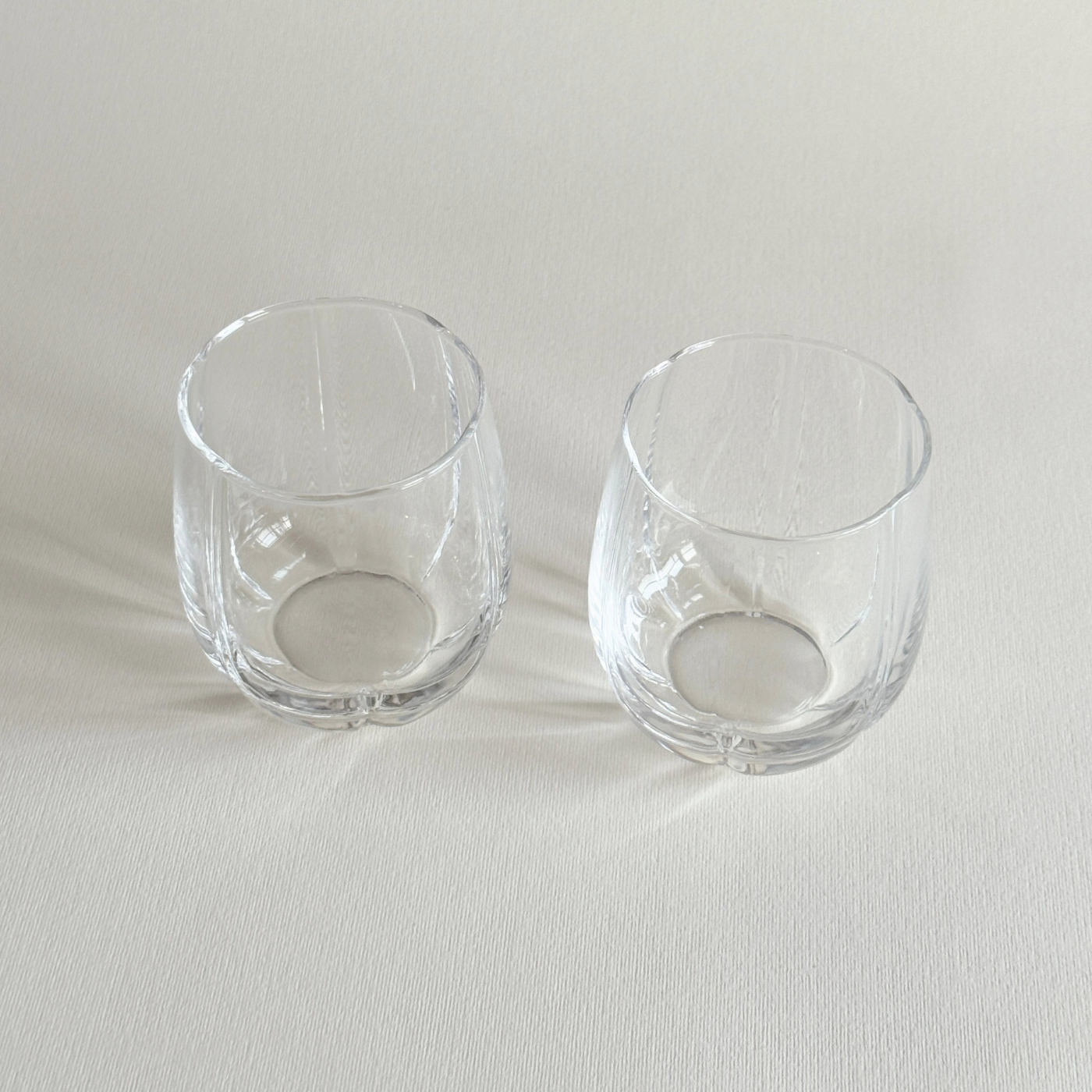 Single fluted crystal tumbler in profile, clear with vertical ribbing