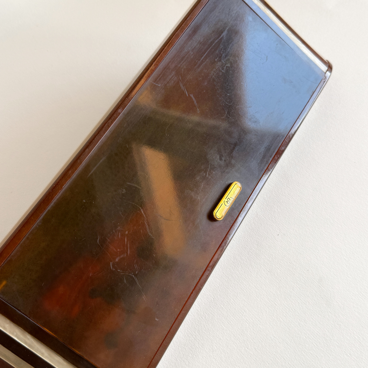 Five poker dice and card decks in a 1970s Italian tortoiseshell Lucite games set by Romagnoli