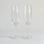 Italian ribbed champagne flutes — set of 2, front view showing ribbed bowl and hexagonal geometric stem, 2000s Italian production
