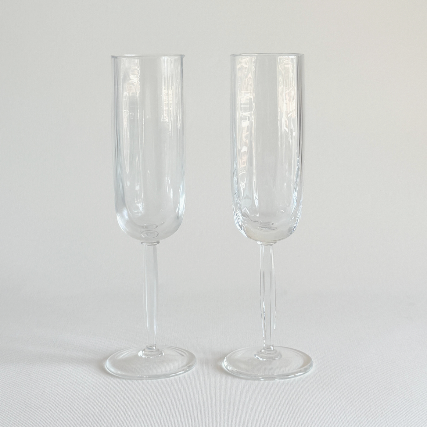Italian ribbed champagne flutes — set of 2, front view showing ribbed bowl and hexagonal geometric stem, 2000s Italian production