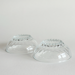 Set of 2 clear pressed glass bowls with bubble feet and round rims, mid-20th century French design from Reims, ideal for desserts or condiments.