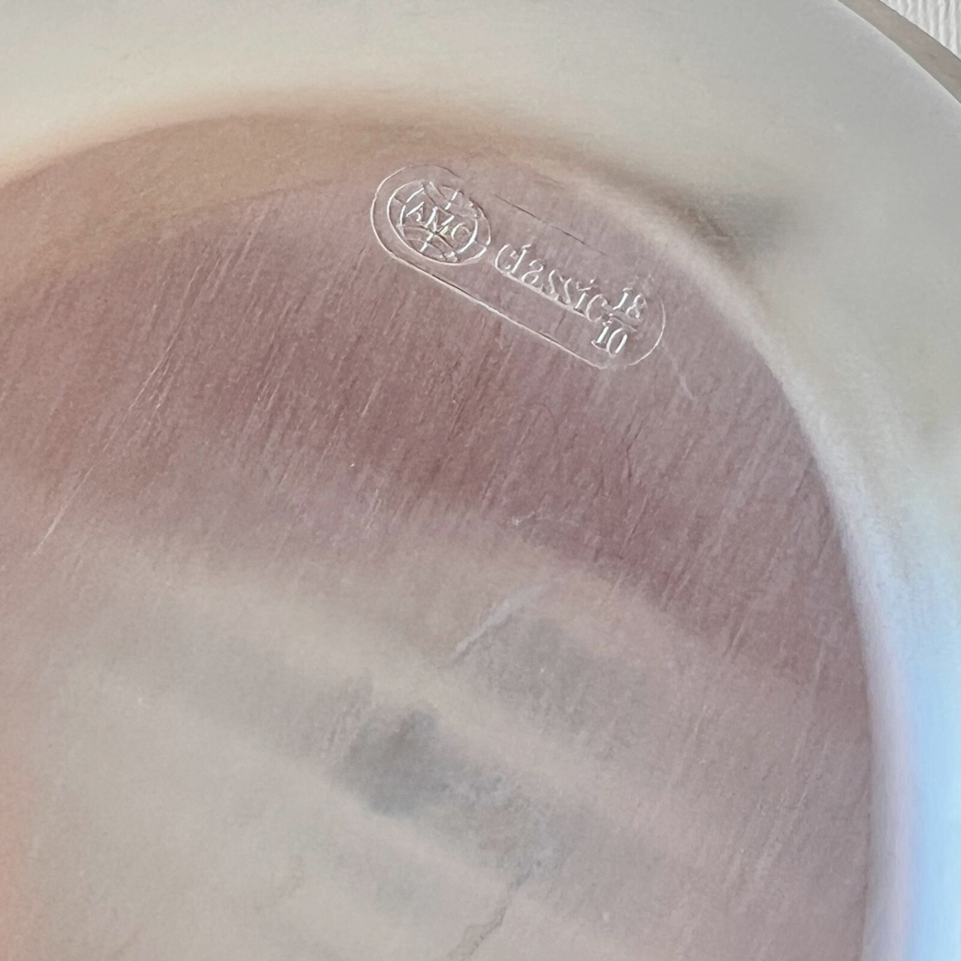 Close-up of brushed stainless steel AMC display bowl