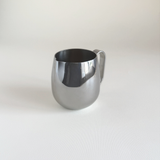 IMCO 1970s Italian creamer in polished steel, pouring lip detail