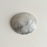 Minimal styling with small alabaster tray for refined everyday use