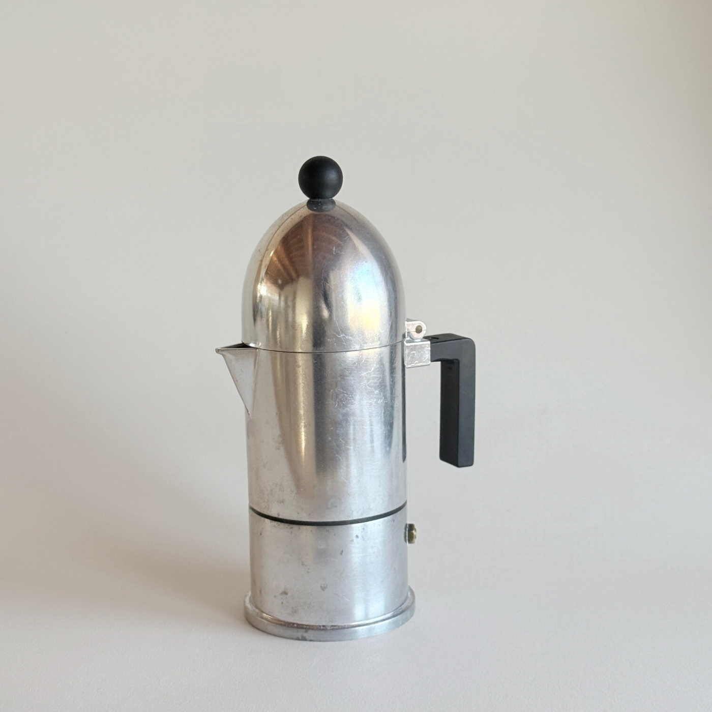 Side view of La Cupola moka pot showing vintage patina