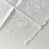 Antique Italian cotton hand towel folded, showing the raised woven pattern