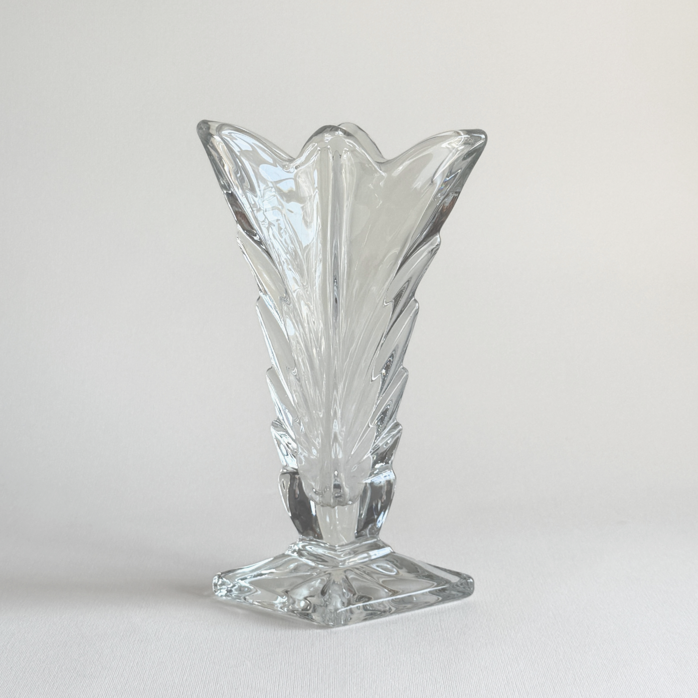 Art Deco cast glass vase — three-quarter view showing geometric moulded form and frosted finish, Bohemian 1930s