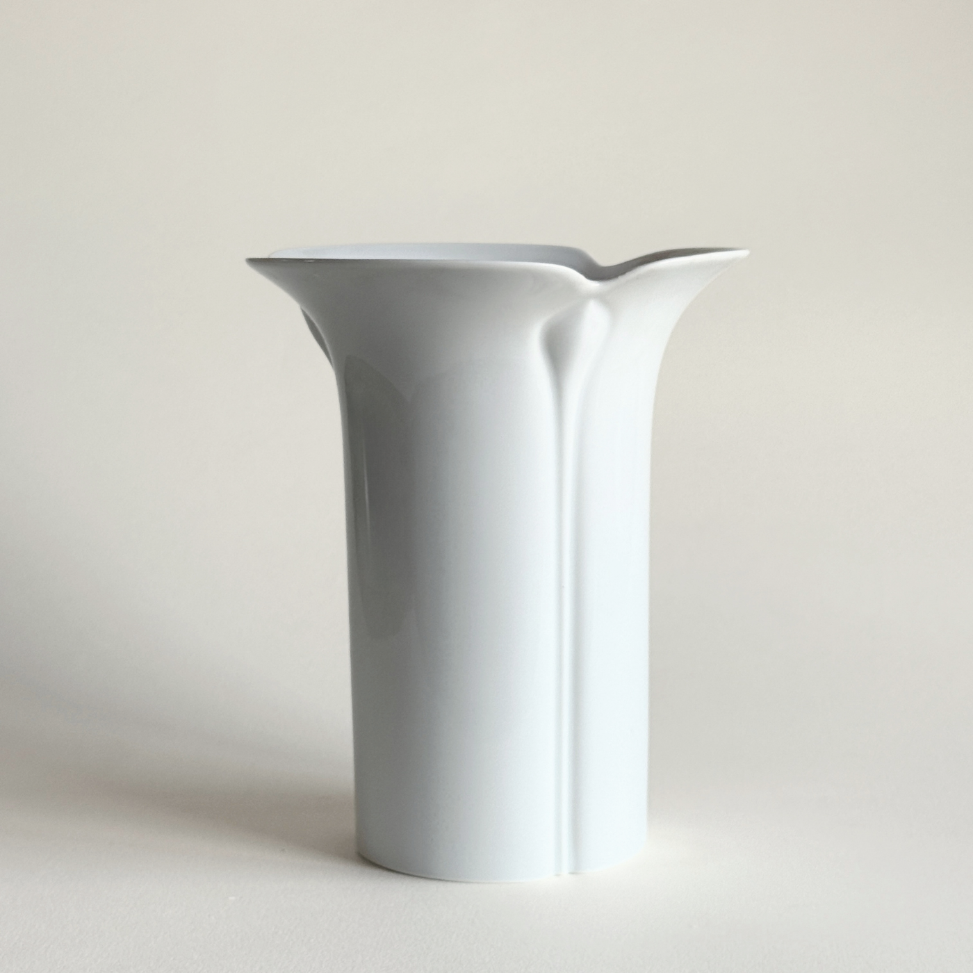 Arzberg white porcelain vase 1970s modernist design styled on neutral surface