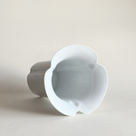 Minimal interior styling with white porcelain vase as focal object