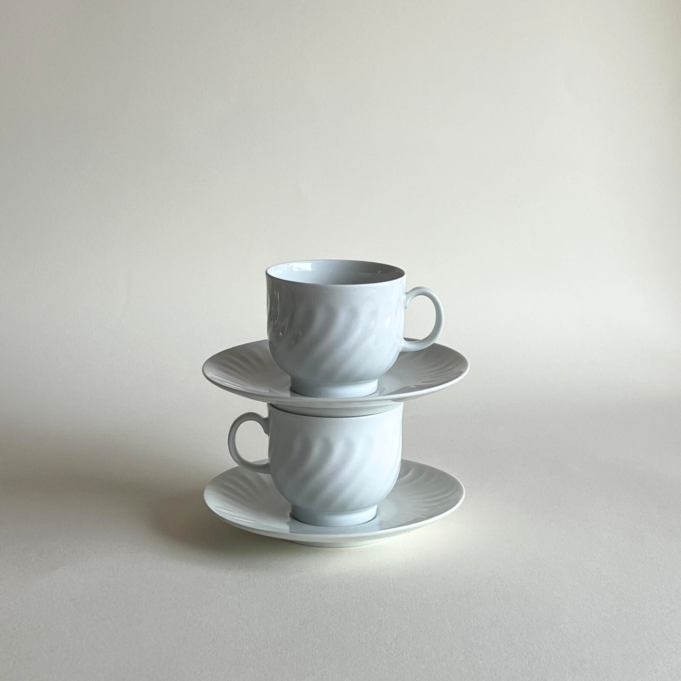Elegant German porcelain coffee cups and saucers
