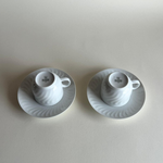 Elegant German porcelain coffee cups and saucers