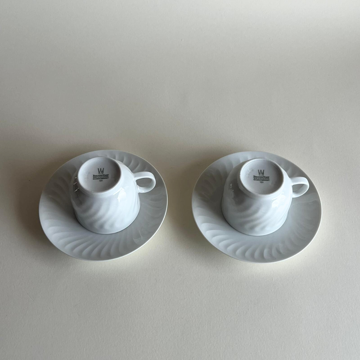 Elegant German porcelain coffee cups and saucers