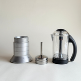Pino Spagnalo Biesse coffee maker silver and perspex split view