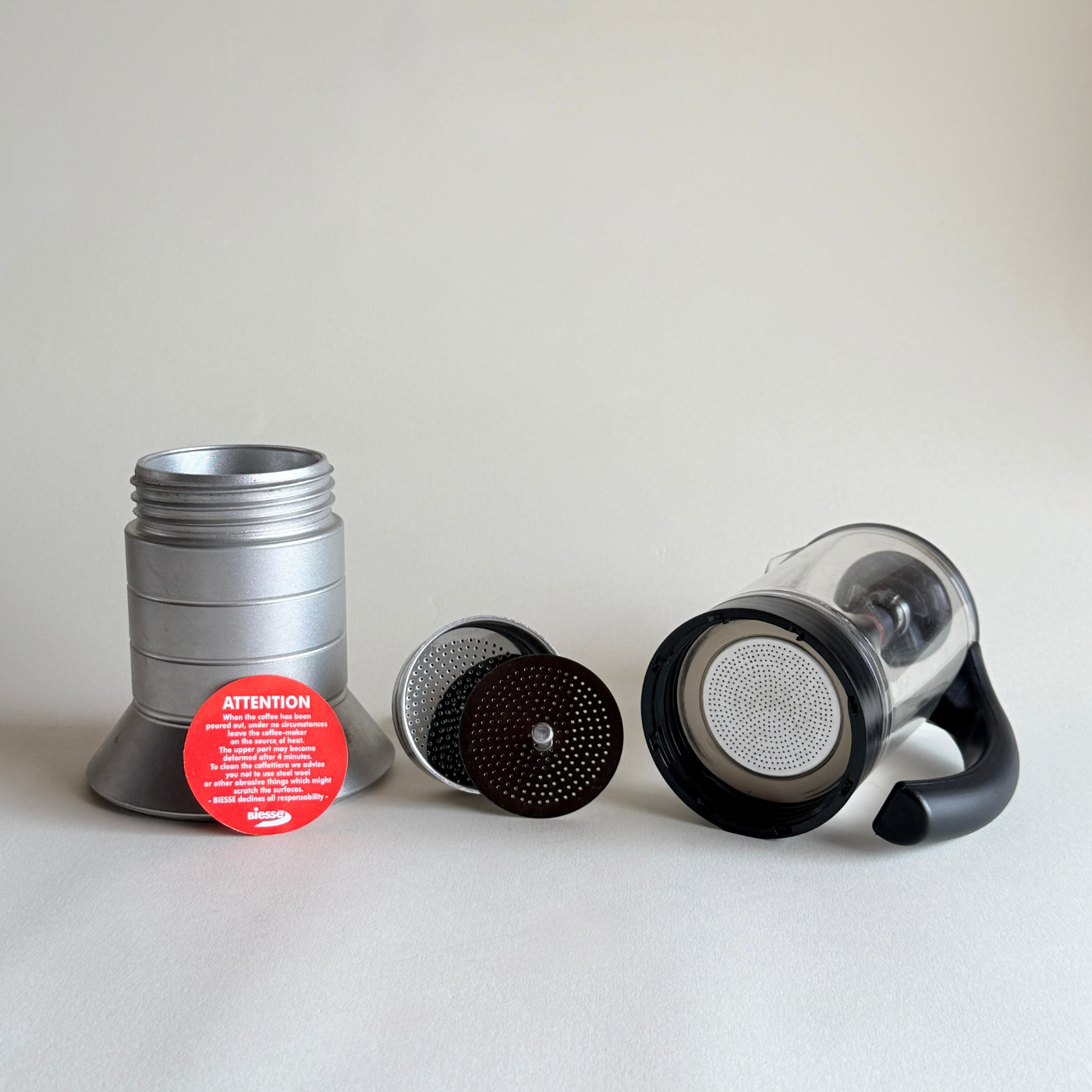 Pino Spagnalo Biesse coffee maker silver and perspex split view