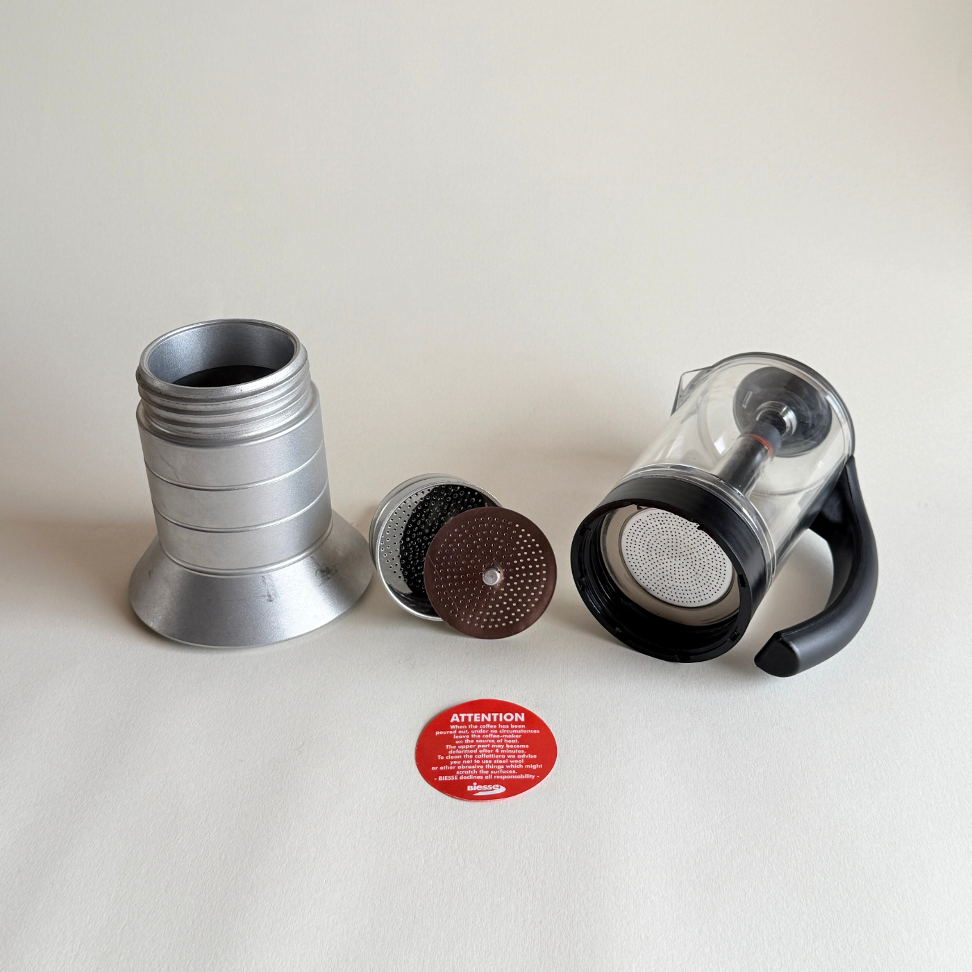 Pino Spagnalo Biesse coffee maker silver and perspex split view