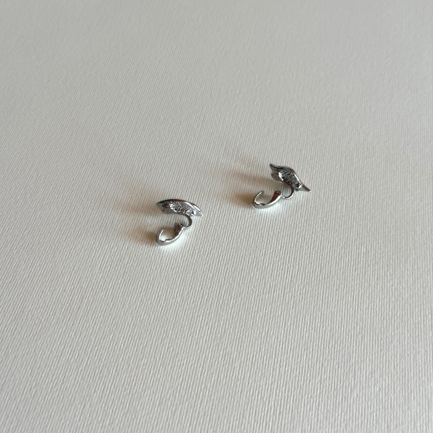 Boucles d'oreilles clip arum | Ton argent · années 1980