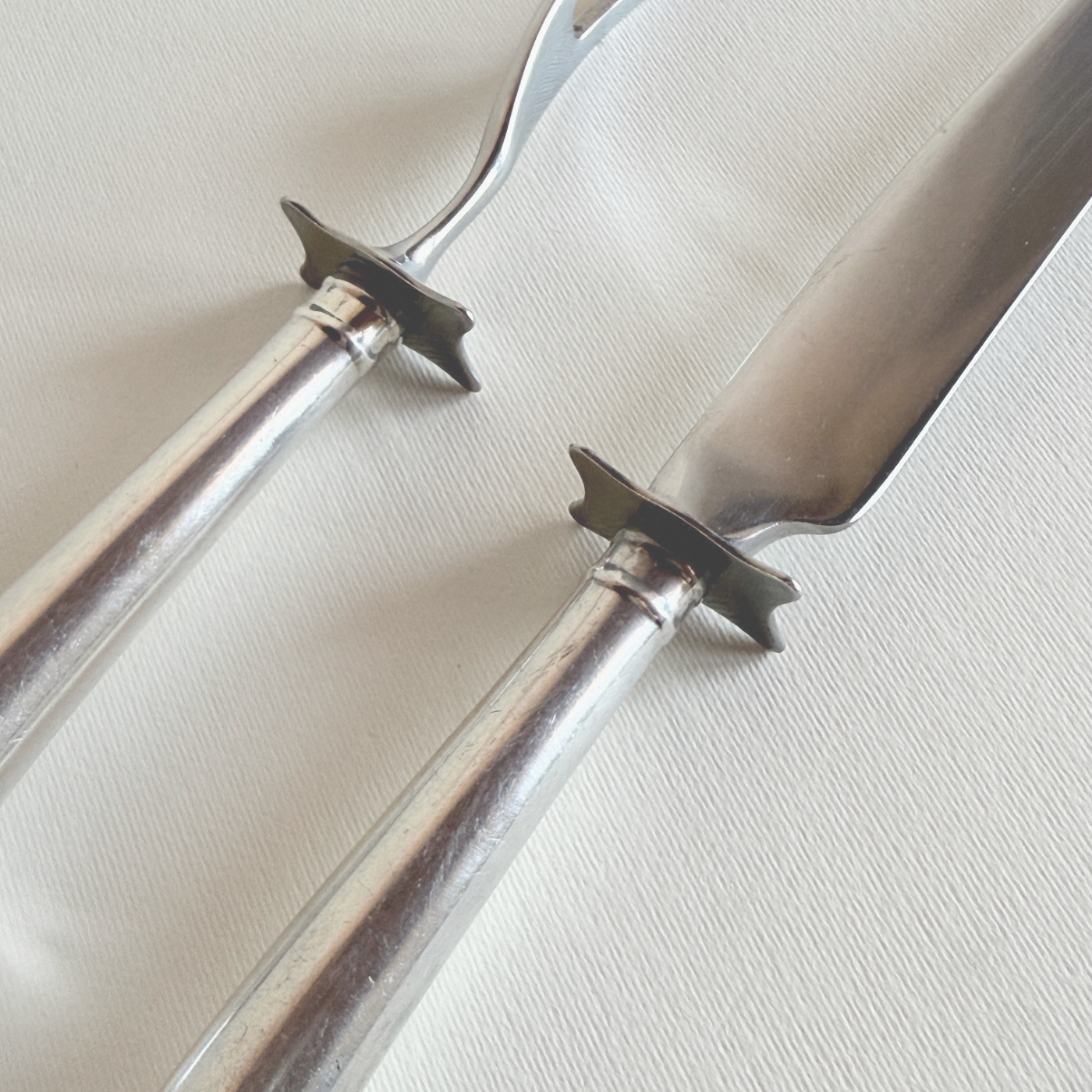 Detail of a silver-plate carving knife blade, 1980s European cutlery