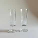 Glass Champagne Flutes, set of two clear glass glasses with ribbed vertical detailing and slender stems