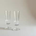 Glass Champagne Flutes, set of two clear glass glasses with vertical ribbed detailing and slender stems